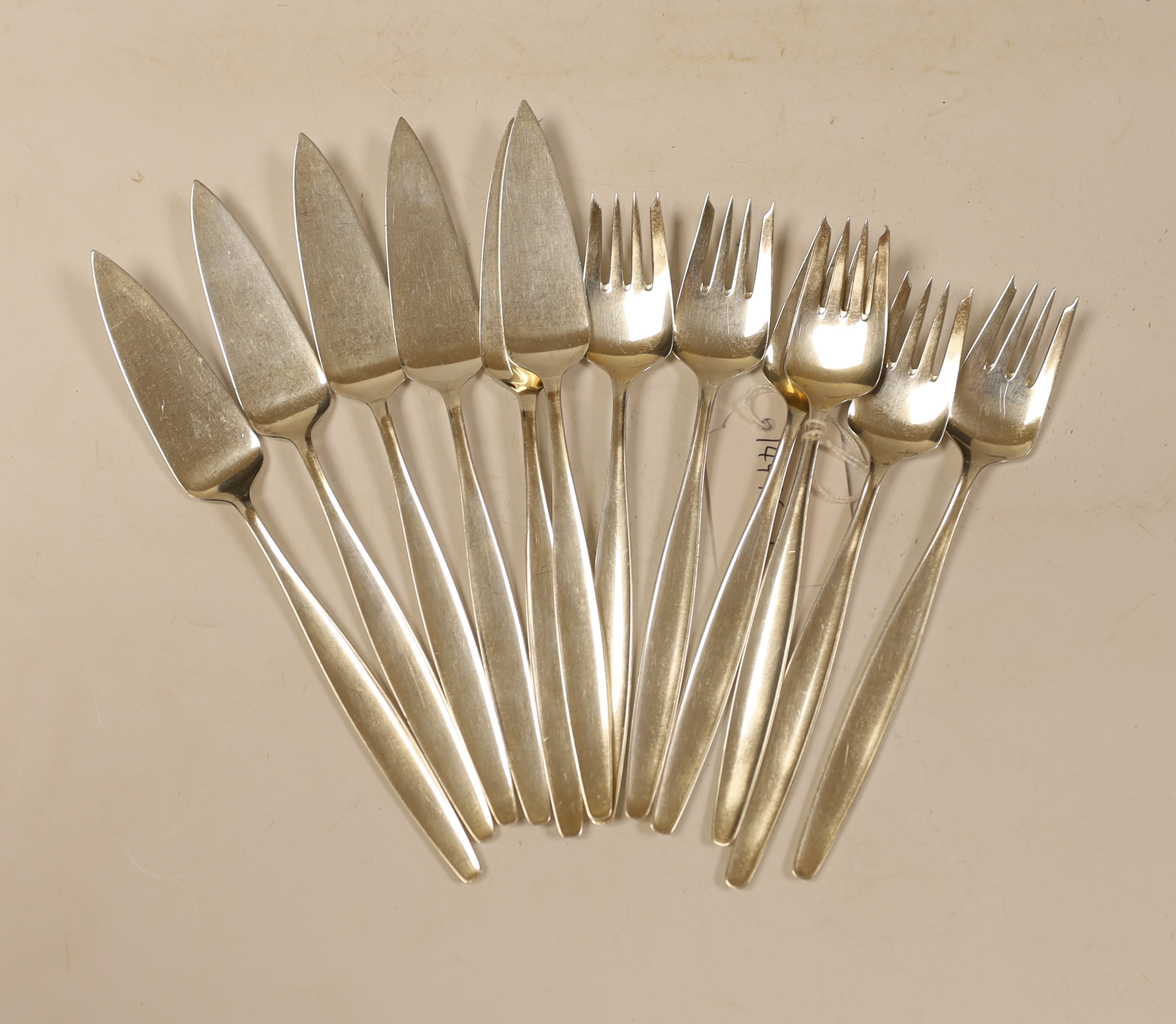 A set of six pairs of 1960's silver fish eaters by Georg Jensen, import marks for London, 1964, knife 19.5cm, 16.5oz.